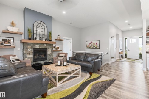 2011 Spring Drive, Rural Parkland County, AB - Indoor Photo Showing Living Room With Fireplace
