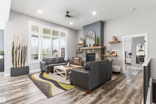 2011 Spring Drive, Rural Parkland County, AB - Indoor Photo Showing Living Room With Fireplace