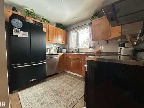 8603 149 Street, Edmonton, AB - Indoor Photo Showing Kitchen With Double Sink