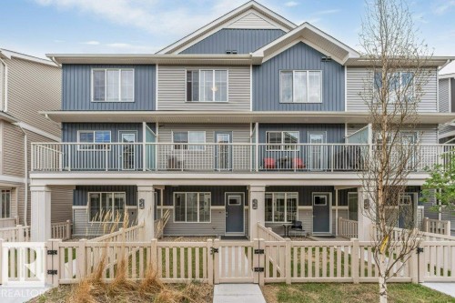 Three-story townhome featuring a multi-tone facade with both horizontal and vertical siding - 53 1110 Daniels Link Link, Edmonton, AB - Outdoor With Balcony With Facade