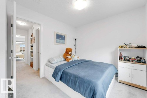 Bright room featuring light-colored carpeting and white walls - 53 1110 Daniels Link Link, Edmonton, AB - Indoor Photo Showing Bedroom