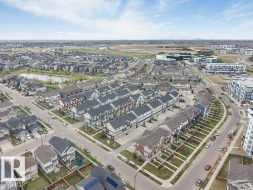 Aerial perspective showcasing a residential community with diverse housing styles - 53 1110 Daniels Link Link, Edmonton, AB -  With View