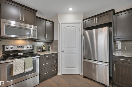 36 Spruce Boulevard, Leduc, AB - Indoor Photo Showing Kitchen With Stainless Steel Kitchen With Upgraded Kitchen