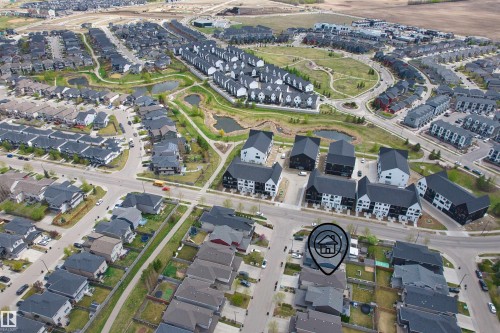 Aerial perspective showcasing a residential community with varied architectural styles - 3807 Claxton Close, Edmonton, AB - Other