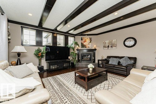 86 Wedgewood Crescent, Fort Saskatchewan, AB - Indoor Photo Showing Living Room With Fireplace