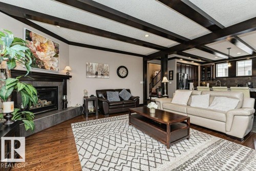 86 Wedgewood Crescent, Fort Saskatchewan, AB - Indoor Photo Showing Living Room With Fireplace