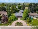 Curved driveway with extensive surrounding landscaping and mature trees - 9010 120 Street, Edmonton, AB  - Outdoor With View 