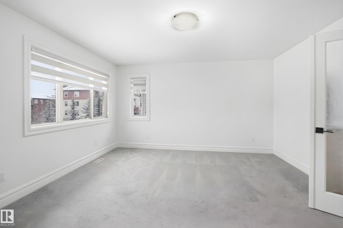 469 Ainslie Crescent Sw, Edmonton, AB - Indoor Photo Showing Other Room
