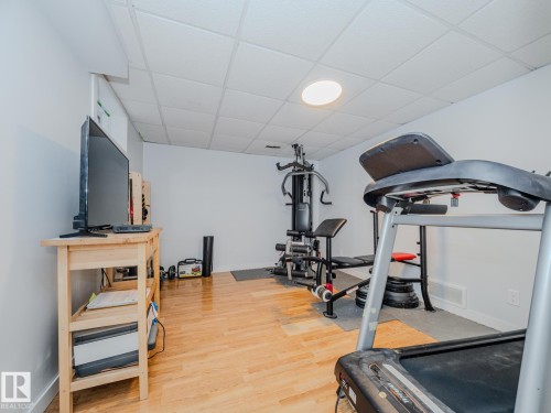 21F Callingwood Court, Edmonton, AB - Indoor Photo Showing Gym Room