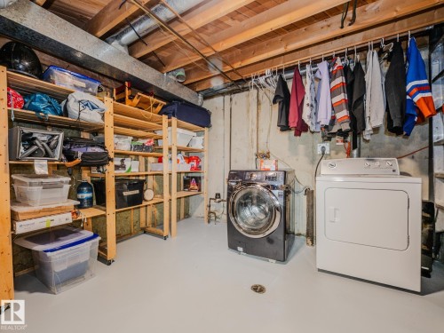 21F Callingwood Court, Edmonton, AB - Indoor Photo Showing Laundry Room