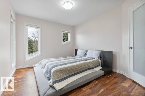 Room featuring wood-finish flooring - 956 Ogilvie Boulevard, Edmonton, AB - Indoor Photo Showing Bedroom