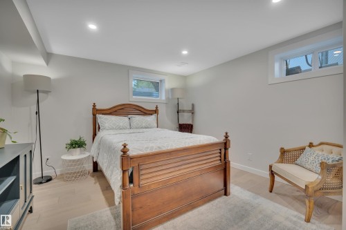 3419 84 Street, Edmonton, AB - Indoor Photo Showing Bedroom With Fireplace