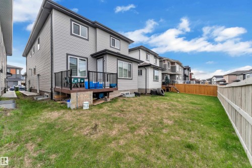 Expansive backyard with a wooden fence - 1827 22 Street Nw, Edmonton, AB - Outdoor With Exterior