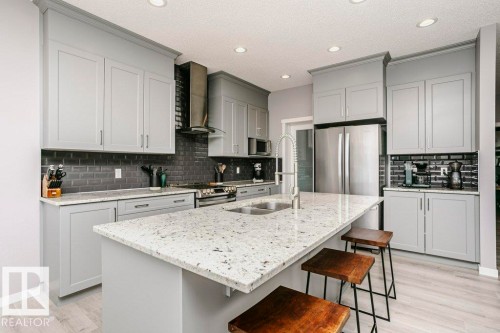 2423 16 Avenue, Edmonton, AB - Indoor Photo Showing Kitchen With Double Sink With Upgraded Kitchen