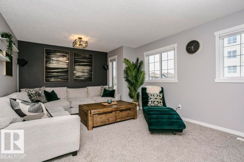 2423 16 Avenue, Edmonton, AB - Indoor Photo Showing Living Room