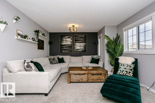 2423 16 Avenue, Edmonton, AB - Indoor Photo Showing Living Room