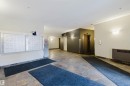 Building lobby featuring a slate tile floor and a wall of mailboxes - 308 4316 139 Avenue, Edmonton, AB 
