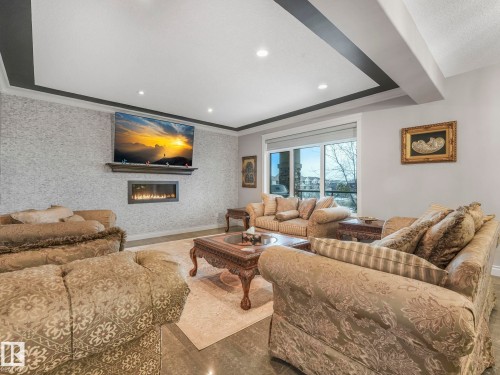 3313 Cameron Heights Landing Landing, Edmonton, AB - Indoor Photo Showing Living Room With Fireplace