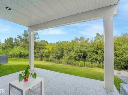 Covered patio featuring a granular texture concrete surface - 
