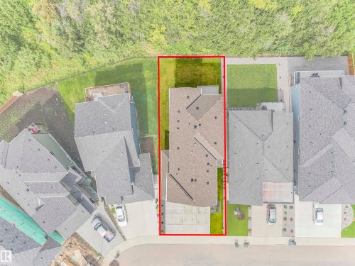 Aerial view showcasing a residential property with a shingle roof and a green lawn - 15 Elwyck Gate, Spruce Grove, AB - Other