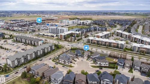 Aerial overview showcasing a developed residential area with multiple housing types - 1508 Cunningham Cape Cape, Edmonton, AB - Outdoor With View