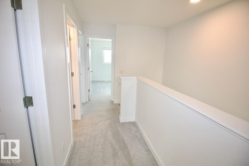 Upper 3862 Chrustawka Place Sw, Edmonton, AB - Indoor Photo Showing Other Room