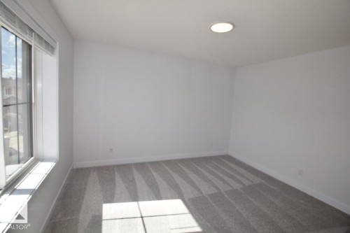 Upper 3862 Chrustawka Place Sw, Edmonton, AB - Indoor Photo Showing Other Room
