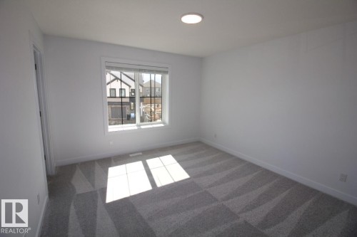 Upper 3862 Chrustawka Place Sw, Edmonton, AB - Indoor Photo Showing Other Room
