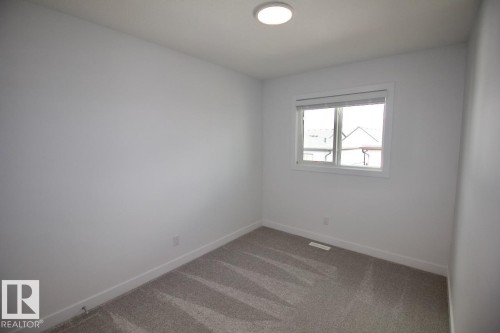 Upper 3862 Chrustawka Place Sw, Edmonton, AB - Indoor Photo Showing Other Room
