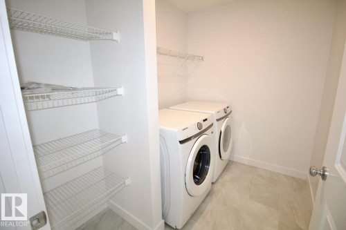 Upper 3862 Chrustawka Place Sw, Edmonton, AB - Indoor Photo Showing Laundry Room