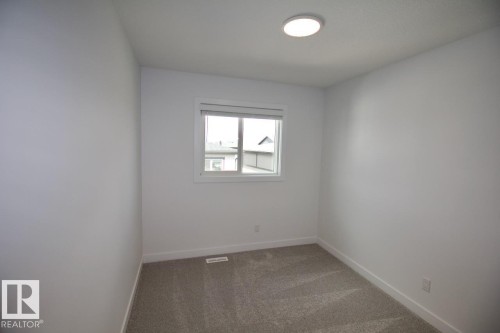 Upper 3862 Chrustawka Place Sw, Edmonton, AB - Indoor Photo Showing Other Room