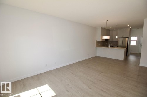 Upper 3862 Chrustawka Place Sw, Edmonton, AB - Indoor Photo Showing Other Room