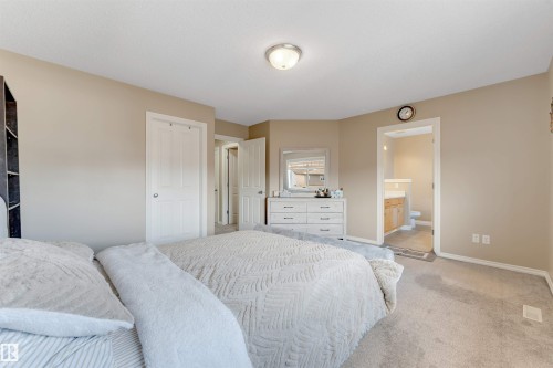 Bedroom space featuring neutral wall paint and carpeting - 121 64 Street, Edmonton, AB - Indoor Photo Showing Bedroom