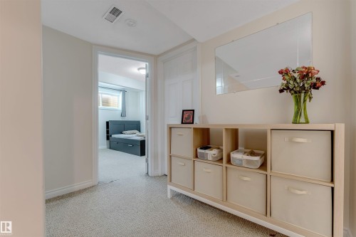 Hallway with light-colored wall paint and matching trim - 121 64 Street, Edmonton, AB - Indoor Photo Showing Other Room