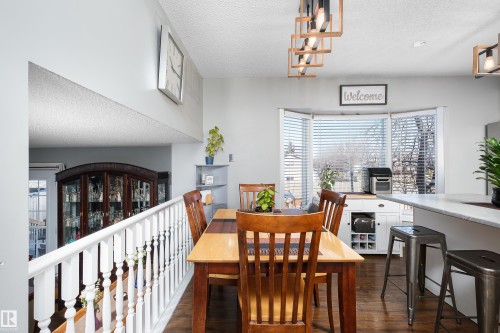 17828 91 Street, Edmonton, AB - Indoor Photo Showing Dining Room With Fireplace