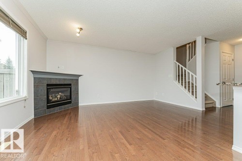 2314 Lemieux Place, Edmonton, AB - Indoor Photo Showing Living Room With Fireplace