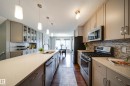 3365 Orchards Link Link, Edmonton, AB  - Indoor Photo Showing Kitchen With Stainless Steel Kitchen With Double Sink With Upgraded Kitchen 