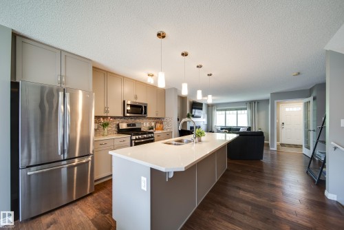 3365 Orchards Link Link, Edmonton, AB - Indoor Photo Showing Kitchen With Stainless Steel Kitchen With Double Sink With Upgraded Kitchen