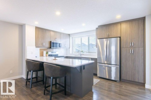 215 Southfork Drive, Leduc, AB - Indoor Photo Showing Kitchen With Stainless Steel Kitchen With Upgraded Kitchen