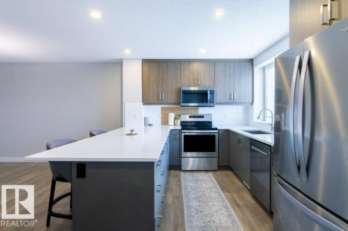 215 Southfork Drive, Leduc, AB - Indoor Photo Showing Kitchen With Stainless Steel Kitchen With Upgraded Kitchen