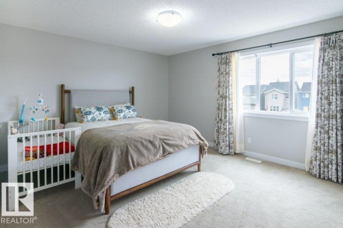 215 Southfork Drive, Leduc, AB - Indoor Photo Showing Bedroom