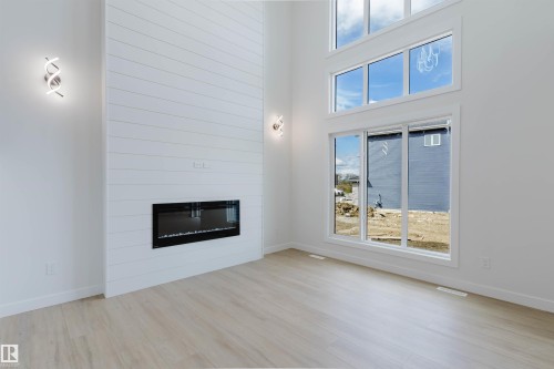 806 Elderberry Court, Edmonton, AB - Indoor Photo Showing Living Room With Fireplace