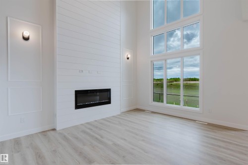 224 Edgemont Green, Edmonton, AB - Indoor Photo Showing Living Room With Fireplace