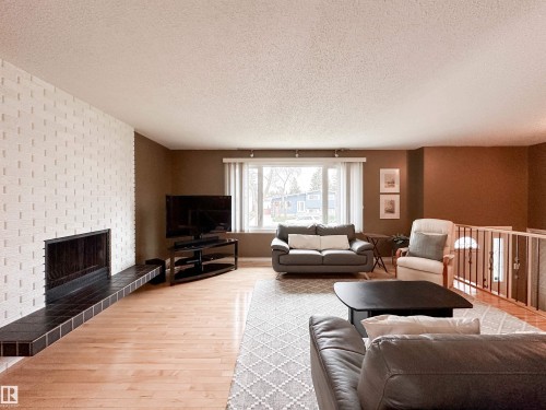 53 Alpine Boulevard, St. Albert, AB - Indoor Photo Showing Living Room With Fireplace