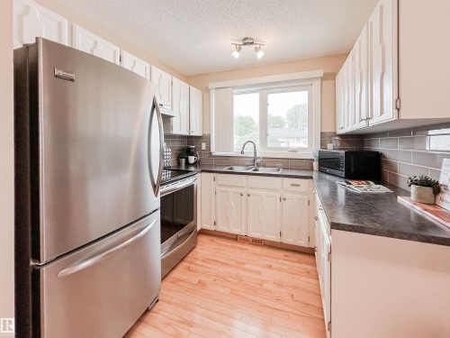 53 Alpine Boulevard, St. Albert, AB - Indoor Photo Showing Kitchen With Double Sink