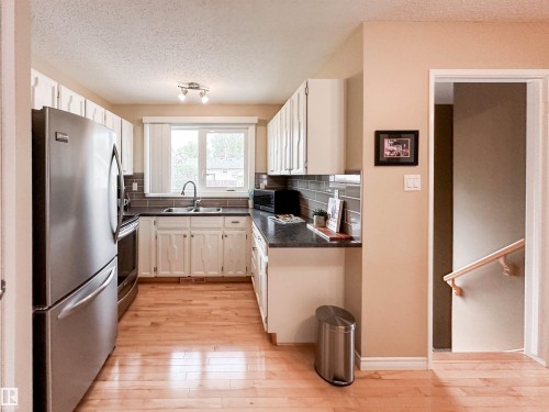 53 Alpine Boulevard, St. Albert, AB - Indoor Photo Showing Kitchen With Double Sink
