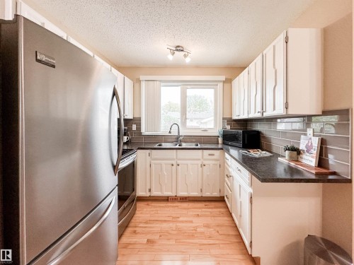 53 Alpine Boulevard, St. Albert, AB - Indoor Photo Showing Kitchen With Double Sink