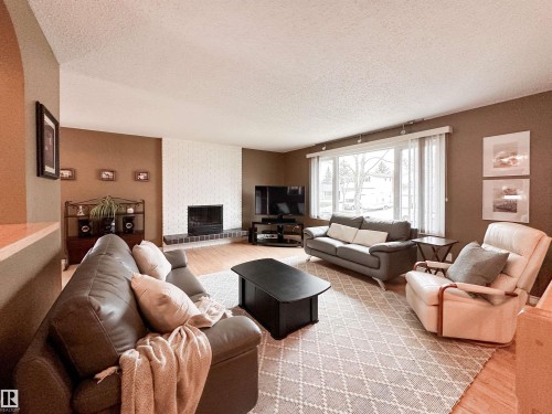53 Alpine Boulevard, St. Albert, AB - Indoor Photo Showing Living Room With Fireplace