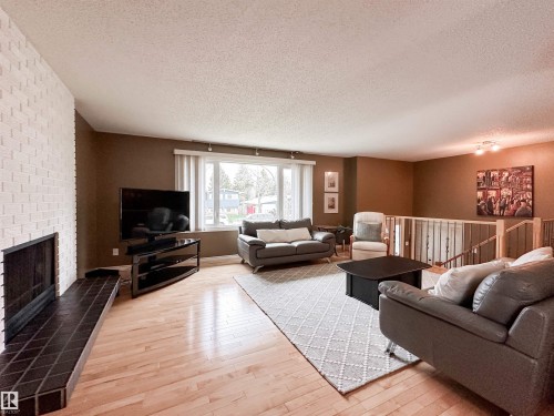 53 Alpine Boulevard, St. Albert, AB - Indoor Photo Showing Living Room With Fireplace