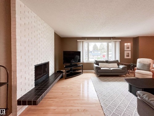 53 Alpine Boulevard, St. Albert, AB - Indoor Photo Showing Living Room With Fireplace